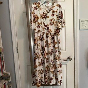 Floral Midi dress with ruffle bottom